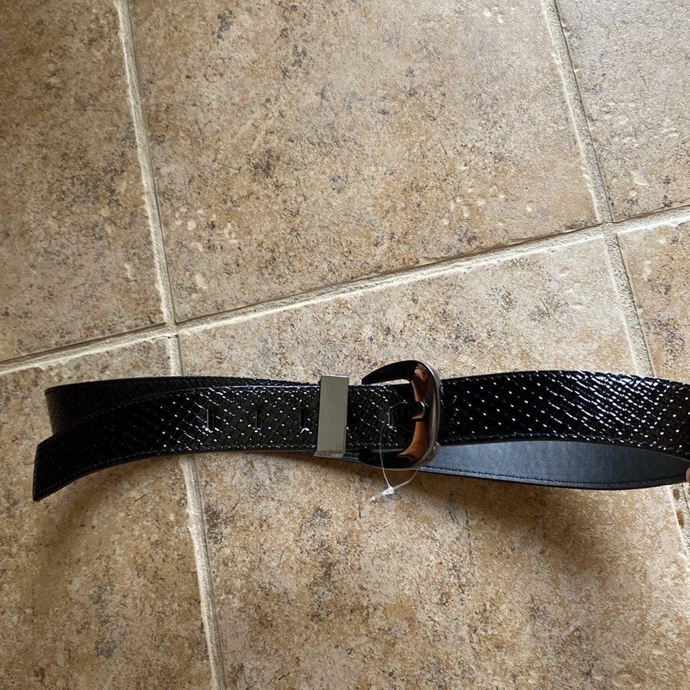 NWOT Black embossed 1.5” width belt with silver buckle, Size: 12 (fits 34”-38”)